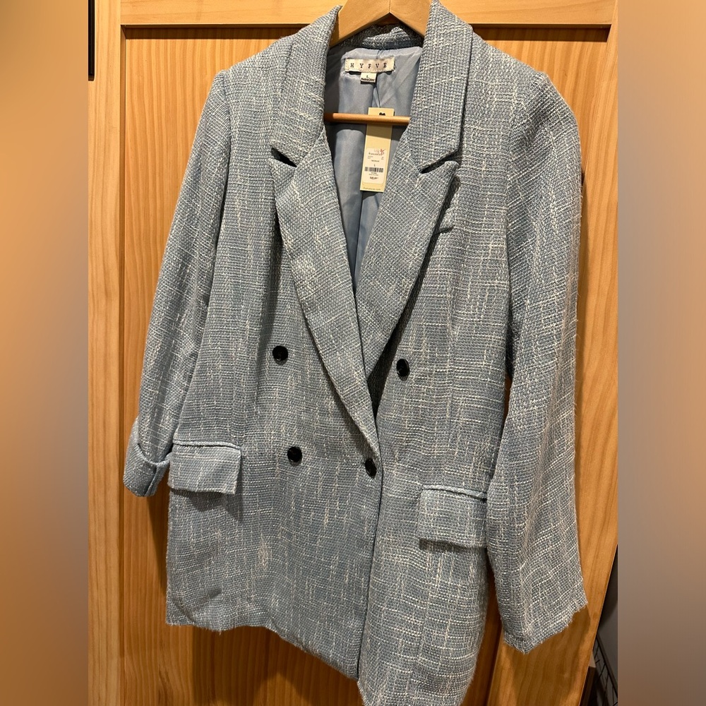 Light blue tweed double breasted blazer. Dress up or down.